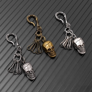 Vintage metal skull keychains with multi-hook clip in antique bronze and silver finishes