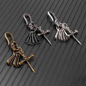 Gothic skull keychains in bronze, silver and grey finishes for biker fashion