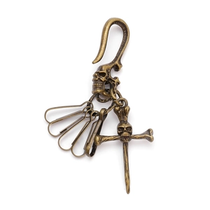 Vintage bronze skull keychain with punk style belt clip and four horseshoe ring pendants