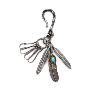 Vintage silver feather keychain with turquoise stone and skull clasp for bags
