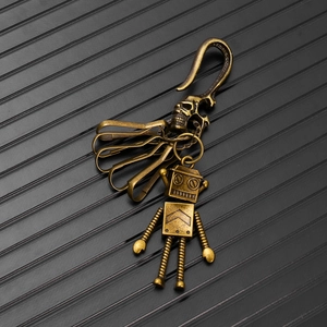 Vintage bronze robot keychain with skull hook and movable joints for bag or pant chain