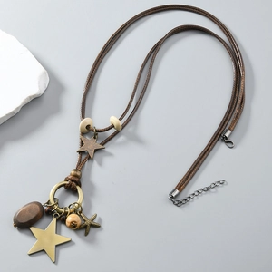 Vintage-Halskette mit Bronze-Sternen und Holzperlen auf brauner Kordel für Damen