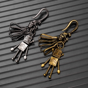 Retro robot pendant keychain with skull engraving and multiple metal clips in dual finishes