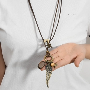 Retro multi-layered long sweater necklace with bronze feathers and wooden beads charm