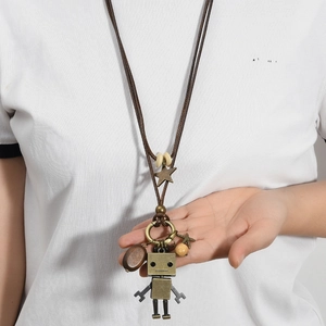 Retro articulated robot pendant necklace with wood beads on long brown cord