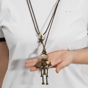 Vintage robot pendant necklace with wood beads and star charms on leather rope