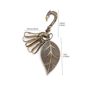Vintage bronze leaf keychain with engraved pendant and four U-shaped key clips for belts