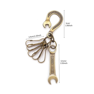 Vintage industrial wrench keychain with bronze horseshoe hook and five metal key clips