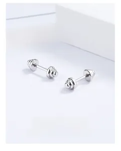 Macro shot of 925 sterling silver dumbbell screw back stud earrings on white background