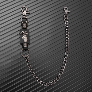 Macro detail of punk wallet chain with metal deer head relief and industrial hooks
