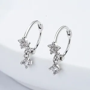Close-up of S925 silver flower hoop earrings with marquise zirconia stones and dangle charm