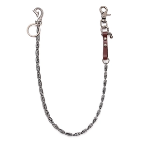 Unisex punk hip hop metal wallet chain with leather rivet detail and bell on white background