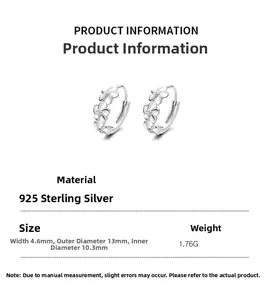 Detailed macro view of 925 sterling silver floral hoop earrings with measurements