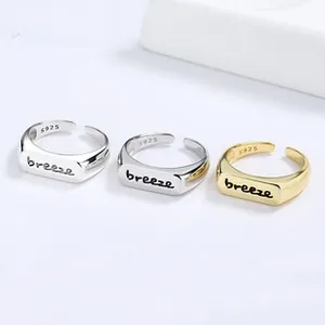Three breeze engraved S925 sterling silver rings in silver, gold, and mixed finishes