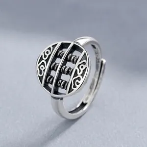 Macro shot of S925 sterling silver abacus ring with vintage cloud pattern details