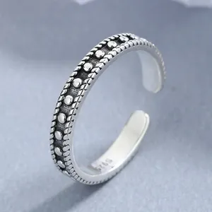 Detail of S925 sterling silver stamp on vintage adjustable ring with dotted texture