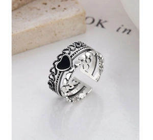 Close-up of S925 hallmark on vintage triple-layered heart ring in sterling silver