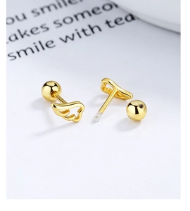 Macro shot of 925 sterling silver wing earrings featuring secure screw-back design and gold finish