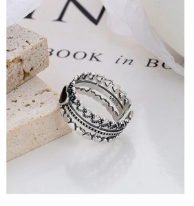 Macro shot of 925 sterling silver triple layer heart ring with vintage black finish