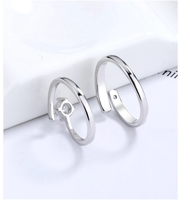 Detailed macro shot of S925 sterling silver couple rings with brilliant zircon stone