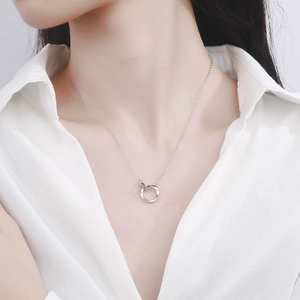 S925 sterling silver Mobius necklace with double interlocking rings shown on model
