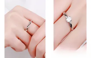 Macro detail of silver twisted rope ring featuring a brilliant-cut cubic zirconia