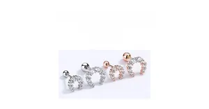 Detailed view of 925 sterling silver horseshoe ear studs with cubic zirconia and screw backs