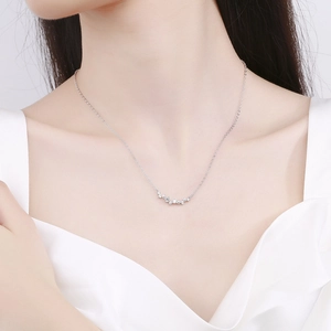Elegant 925 sterling silver smile necklace with sparkling cubic zirconia on neck