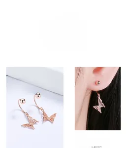 Detailed macro view of rose gold hollow butterfly earrings made of 925 sterling silver