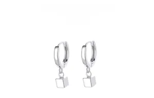Detailed view of 925 sterling silver minimalist geometric square hoop earrings with cube charm
