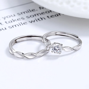 Adjustable S925 sterling silver Mobius couple rings with zircon in a bright white setting