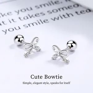 Sterling silver hollow bow earrings with sparkling cubic zirconia and screw ball backs