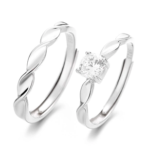 Pair of Mobius S925 sterling silver couple rings with twisted leaf texture and zircon
