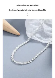 Macro detail of S925 sterling silver phoenix tail chain with fine woven texture