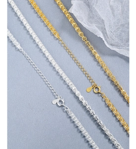 Close-up of S925 sterling silver phoenix tail chains in gold and silver finishes