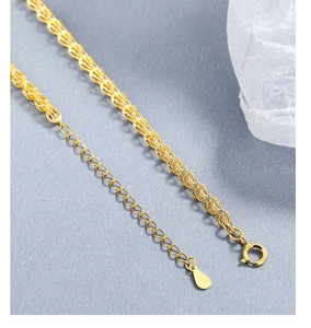 Macro shot of S925 sterling silver phoenix tail chain with spring clasp and hallmark