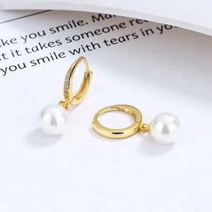 Elegant gold S925 sterling silver hoop earrings with white teardrop pearl pendants