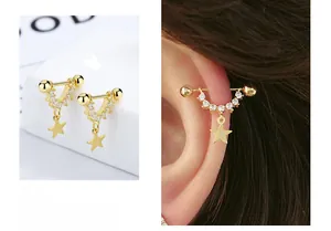 Macro shot of gold S925 sterling silver U-shaped star earrings with pavé zircon stones