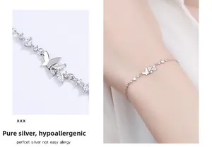 Detailed macro view of 925 sterling silver butterfly bracelet with zirconia leaf inlay