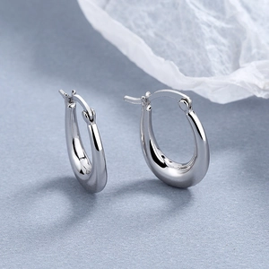 Polished S925 sterling silver U-shaped drop earrings with a minimalist sleek finish