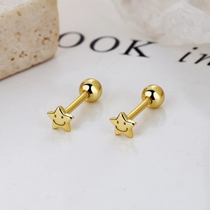 Gold star smile face earrings with screw back ball closure on elegant white background