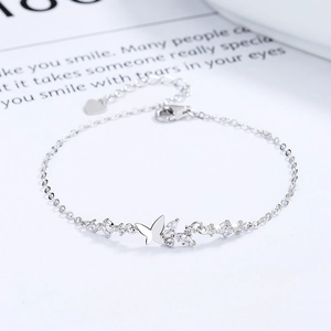 Elegant S925 sterling silver butterfly bracelet with shimmering zircon stones on white background