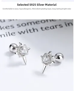 Gros plan de boucles d'oreilles étoile en argent S925 avec pierre de zircone brillante