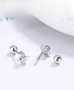 Detail of 925 sterling silver planet stud earrings with screw backs and cubic zirconia
