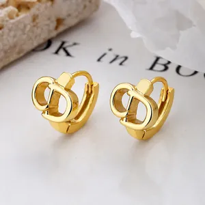 Chic 925 sterling silver CD letter hoop earrings with a polished gold finish for women
