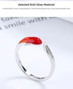 Detailed shot of 925 sterling silver koi fish ring with red and orange enamel finish