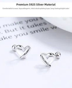Detailed view of S925 sterling silver hollow heart stud earrings with screw backs