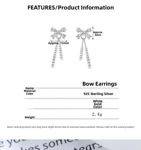 Detail view of 925 silver bow stud earrings with dimensions and tassel specifications