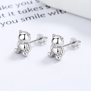 Macro shot of 925 sterling silver 3D teddy bear stud earrings with S925 butterfly backs