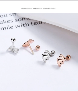 Detailed view of silver rabbit screw back earrings in silver and rose gold finishes